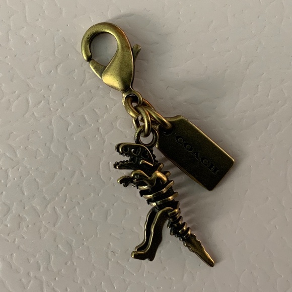 COACH REXY DINOSAUR CHARM BAG TAG KEY FOB brass - Picture 1 of 4